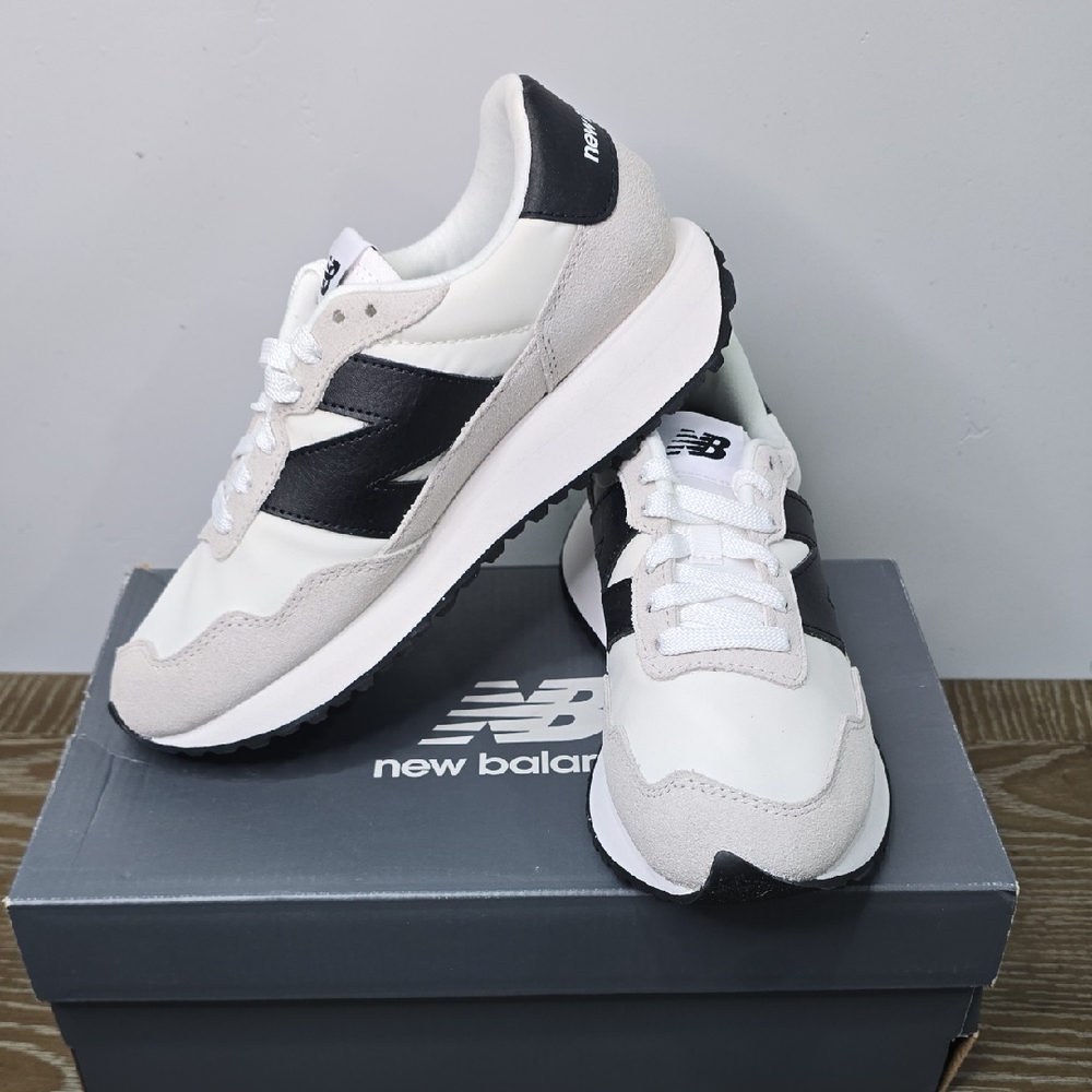 New Balance Classic White and Black Sneakers